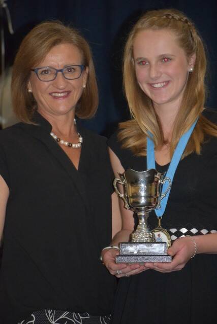 Sporting achiever: Presbyterian Ladies' College principal Nicola Taylor with Junior Sportsperson of the Year Jorja Power. 