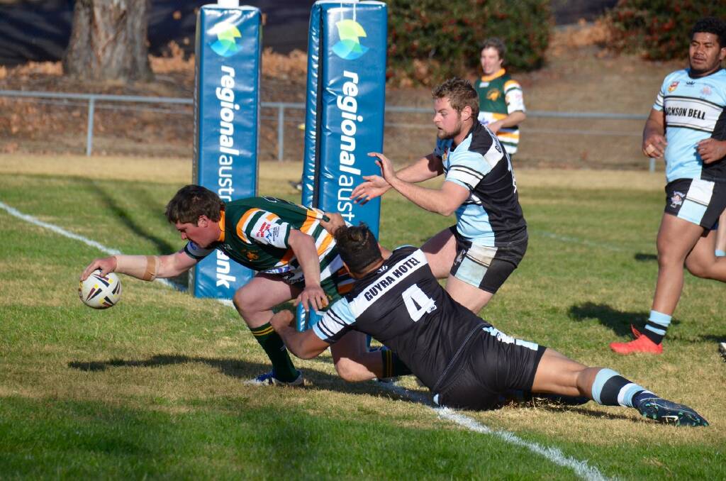  Golden moment: Roos back rower Max Abraham scores last Sunday.