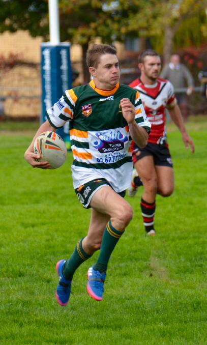 A turn of speed: Roos player Jhorden Coulter in full flight last Saturday.