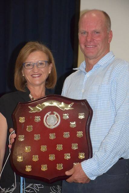 With thanks: Greig Stier is presented with his award by PLC headmaster Nicola Taylor.