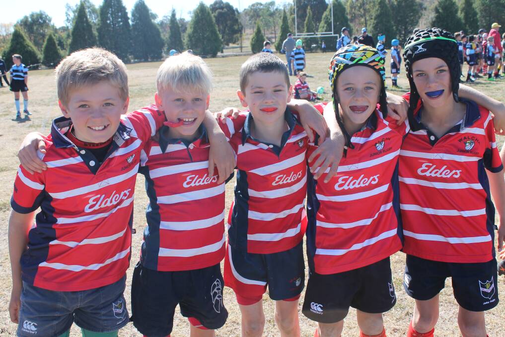 Good mates: Ollie Overton, Hamish Warden, Charlie Crawford, Corbin Latham and Hayden Benson take a well-earned rest at the Junior Rugby Carnival held in Walcha last Sunday.