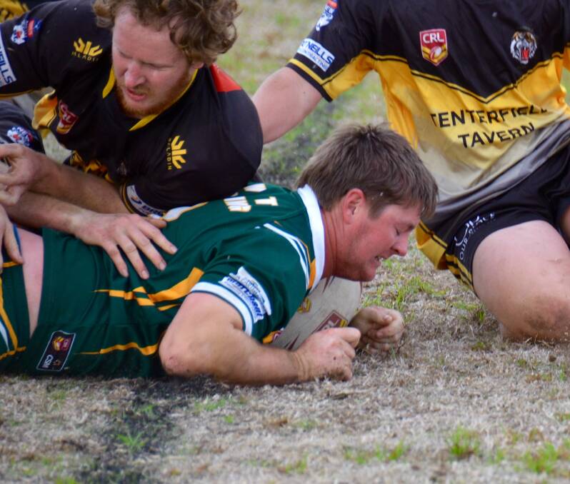 HAT-TRICK: Jock Abraham bustles over the line for his third try of the match against Tenterfield. Photo: Ellen Dunger. 