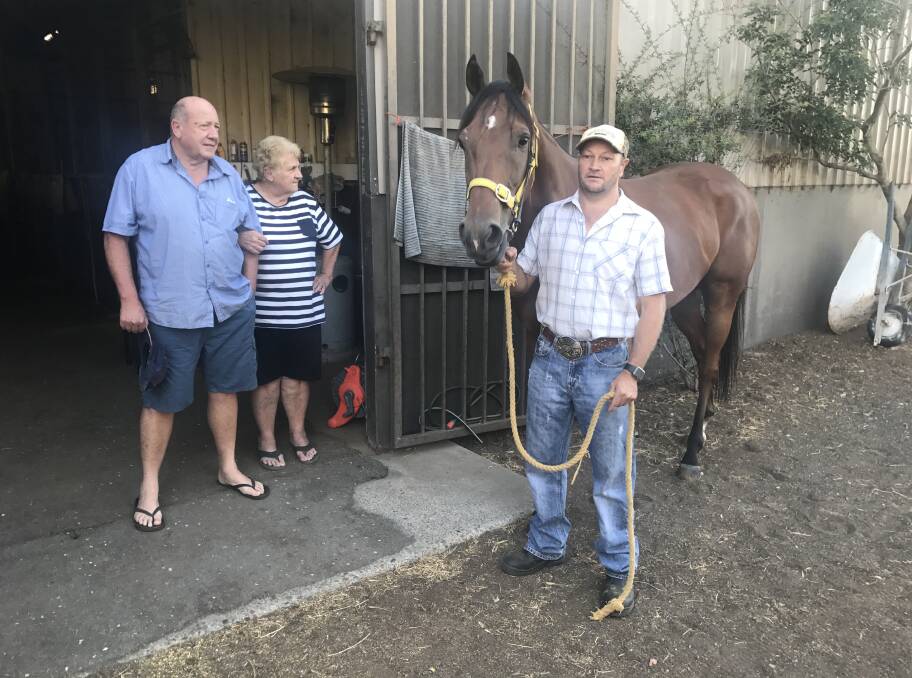 Troy ONeile with Walcha Cup star Try 'N' Run A Muck and owners Dave and Gail Bastable