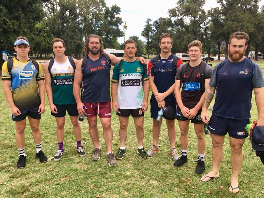 Simon Newton (centre) with some of his Australian Stockman rugby tour team-mates. Photo courtesy of Australian Stockman Rugby Union Facebook page.