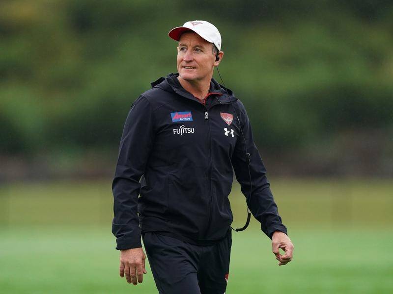Essendon coach John Worsfold emerges from a two-week COVID-19 isolation period on Thursday.