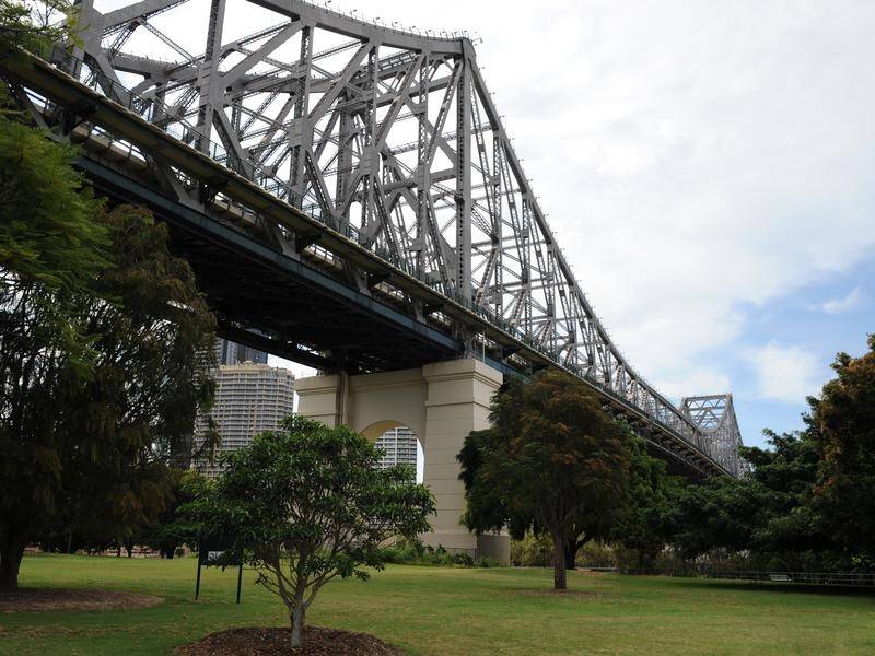 Refugee advocates plan action in a Brisbane park after their Story Bridge protest was banned.