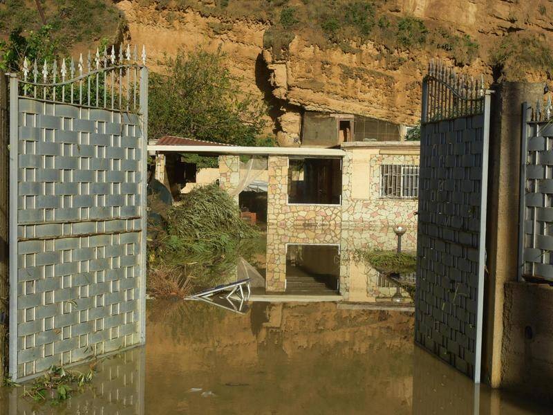 Nine bodies have been found in a villa in Sicily after a nearby river swelled and flooded the home.