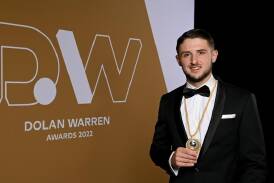 Melbourne Victory's Jake Brimmer proudly displays the Johnny Warren Medal he won in 2022. (Bianca De Marchi/AAP PHOTOS)