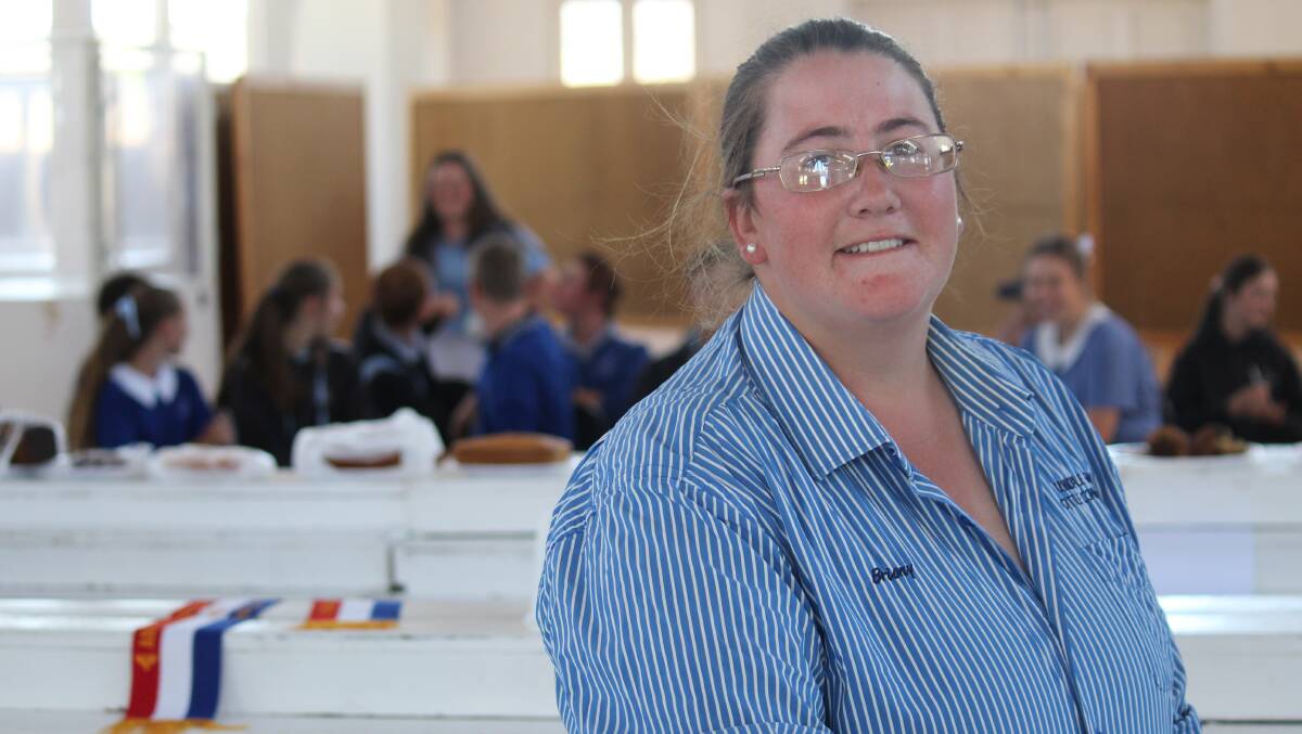 GREAT SHOW: Briony Looker in front of some O'Connor Catholic College Year 10 students attending a young judges instruction and education workshop at the showground.