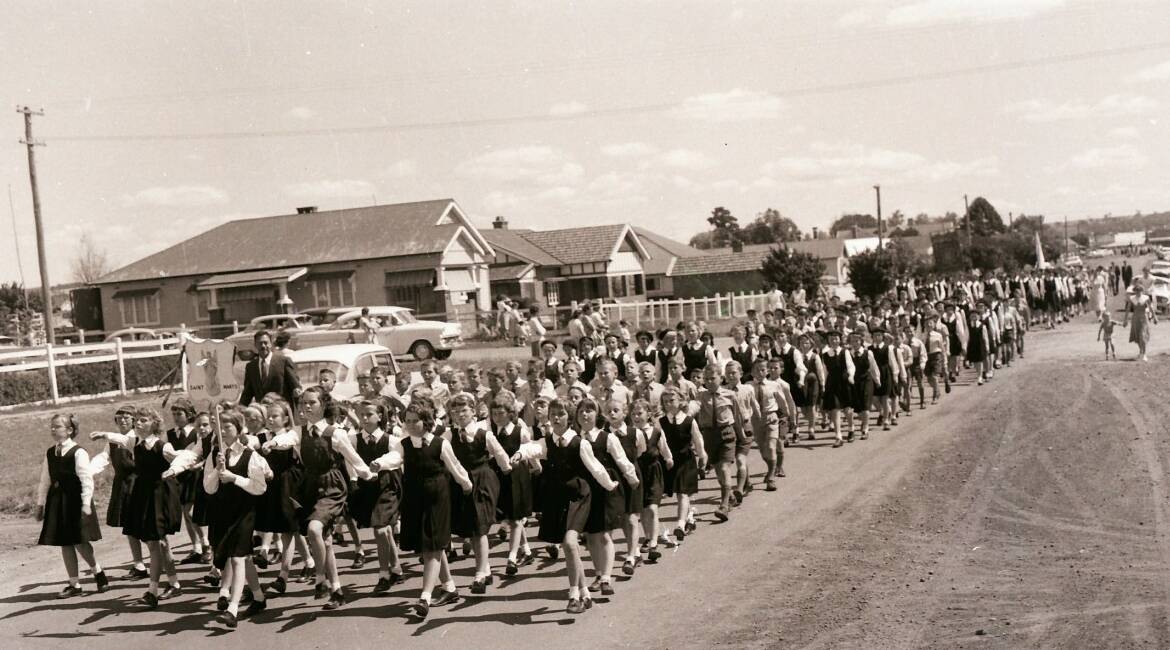 1963: Students march during education week.
