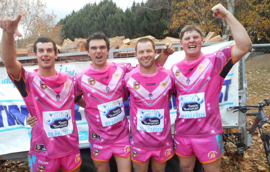 Pretty in pink: Roos Jack McAlister, Steve Eveleigh, Jason Latham and Jock Abraham happy after their win last Saturday.