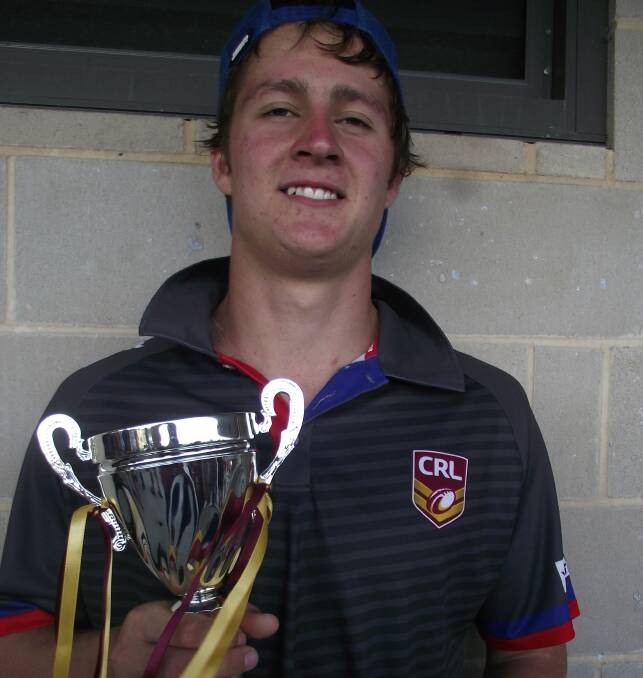 Sam Abraham with the Laurie Daley Cup.