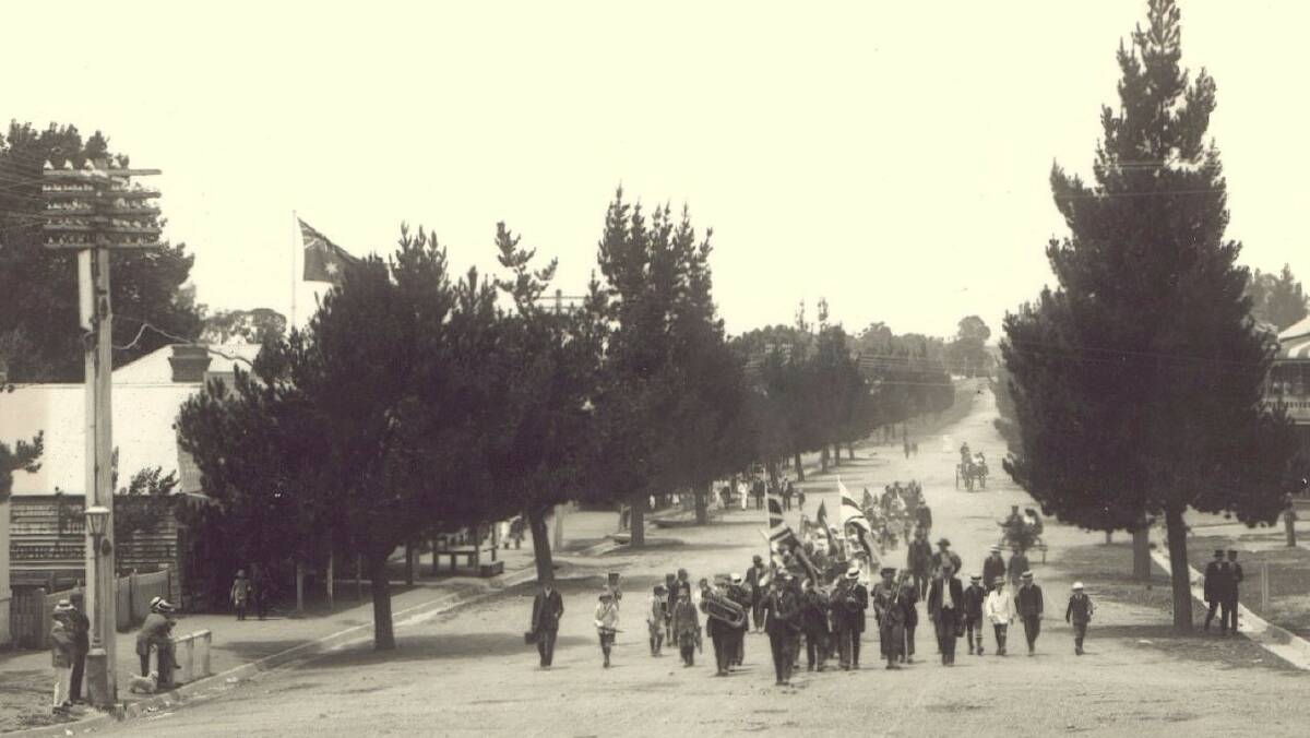 A group of Walcha’s WWI recruits led by the town band while marching up Derby Street to a send-off at the showground.