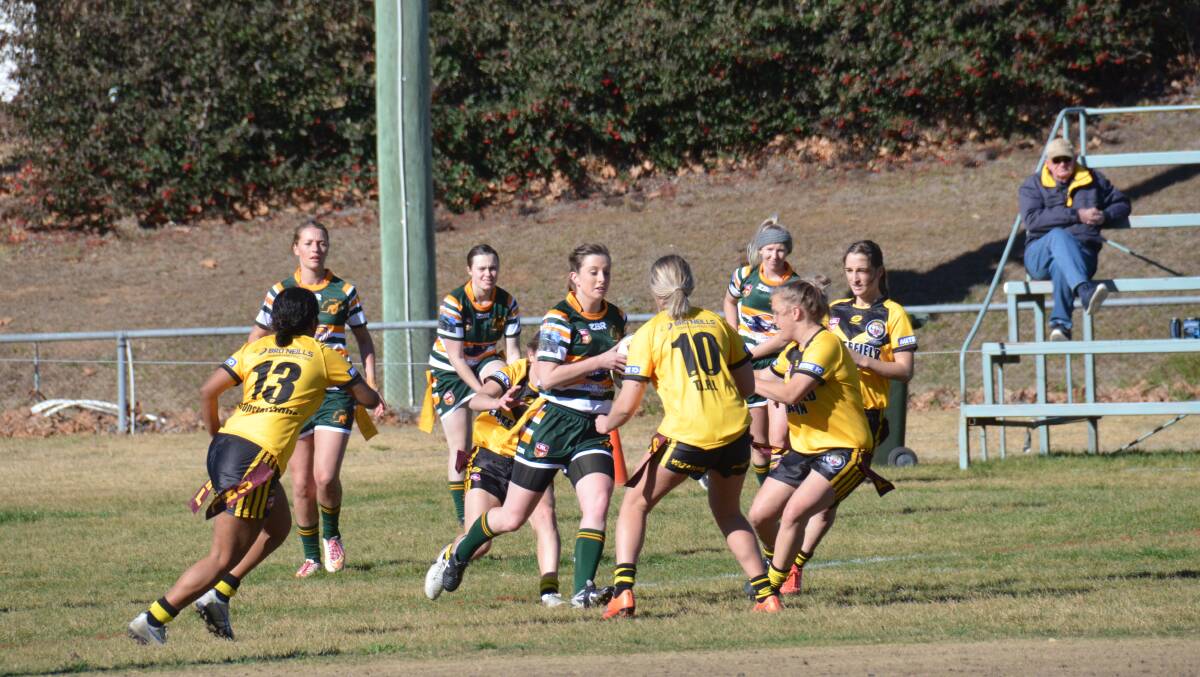 Straightening the attack: Ellen Dunger hits it up for the Jillaroos in their 30-4 win over Tenterfield on the weekend.