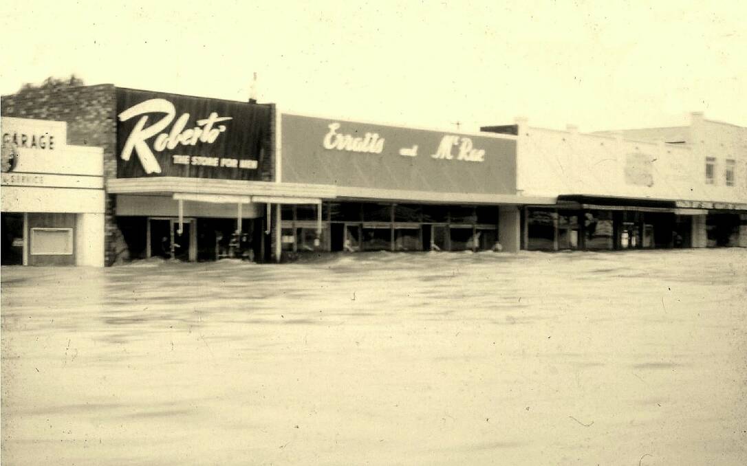 Extensive damage: Floodwaters in Derby Street on Friday, January 12, 1962.